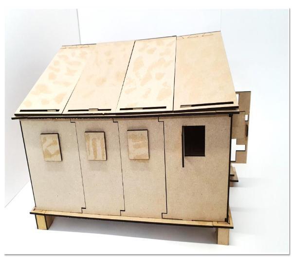 A side view of a scale model of a refugee shelter designed by UCA student Muhannad Darwish