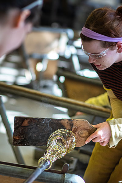 Glass blowing demonstrations and a tour of the glass, ceramics and jewellery workshops
