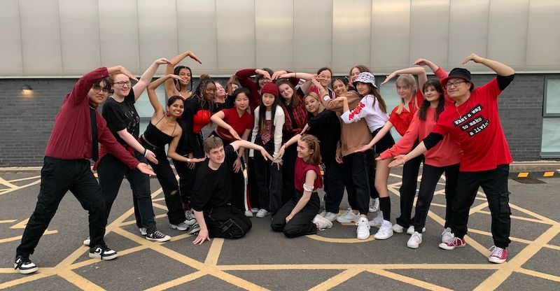 A group photo of members of the UCA Farnham K-Pop Dance club