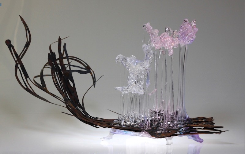 An abstract piece of glass art of dark and light by Kate Courtney-Taylor
