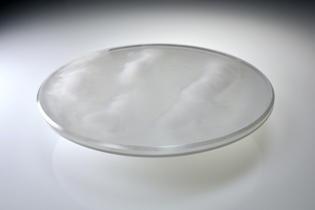 A glass dish reflects the sky by artist Steph Harper