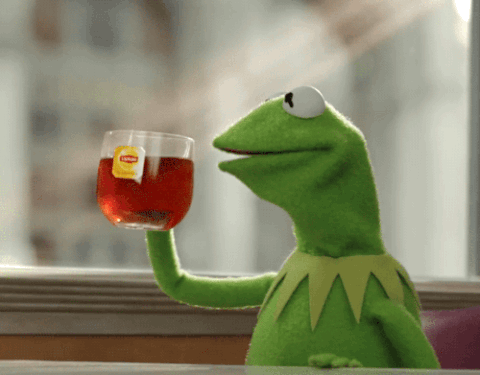 A gif of kermit the frog sipping tea