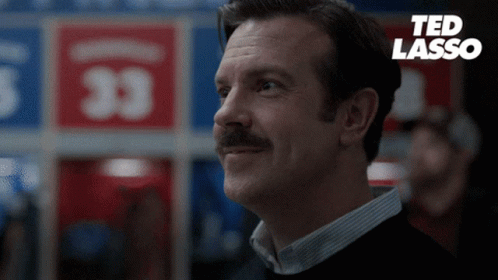 Ted Lasso, football coach (gif), says 