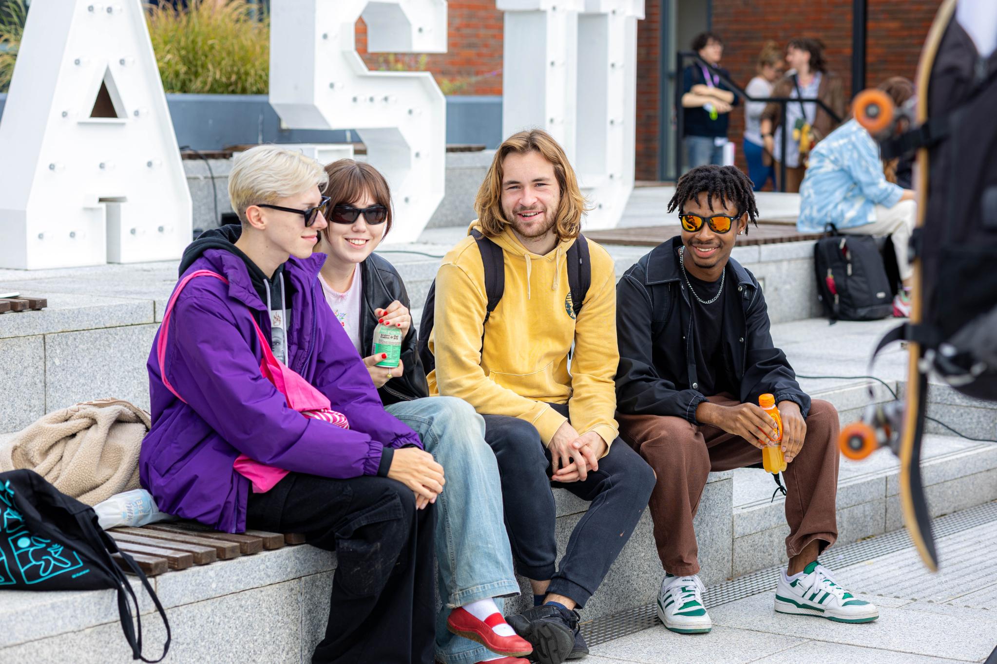 A group of students talking at a Freshers event