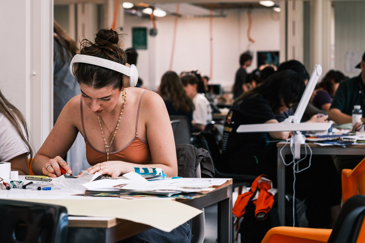 Student working in a graphics studio