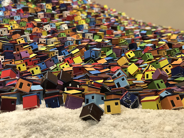 The ceramic houses sit on a bed of salt