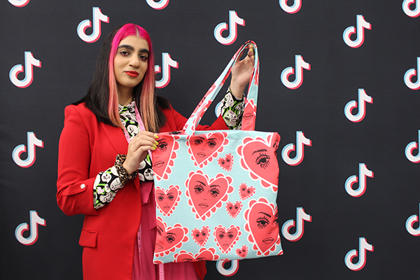 Hally Ahmed with her final print and tote bag