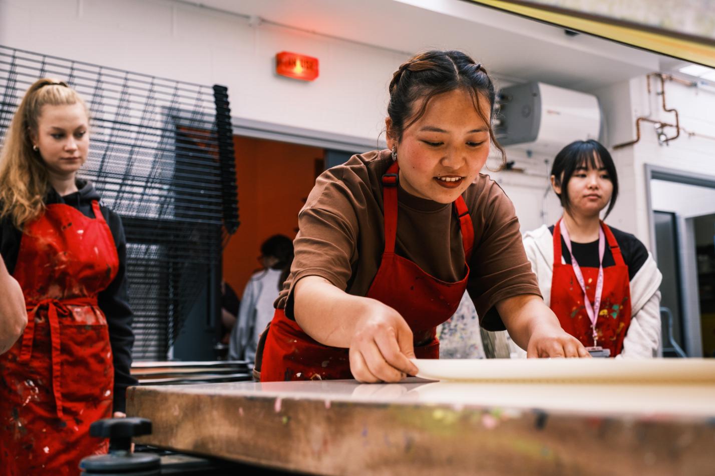 Students working in a design studio