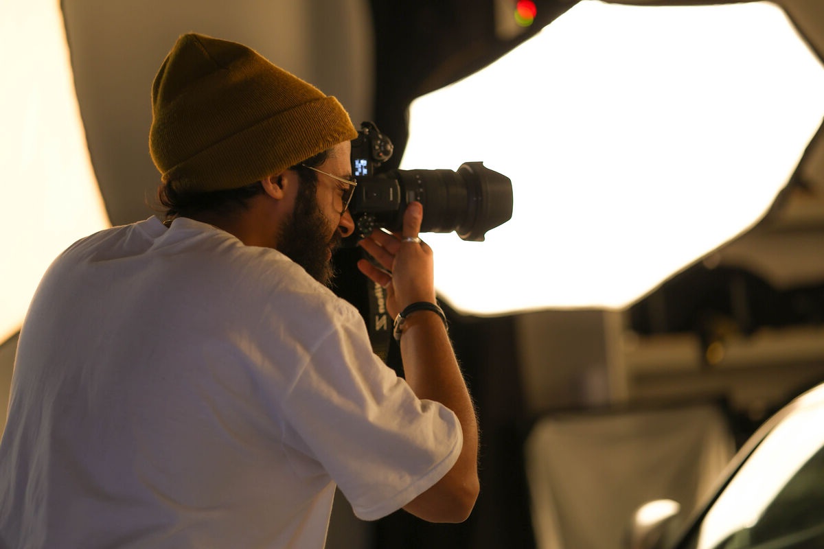 Photographer in a UCA photography studio